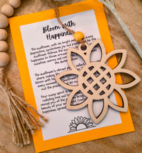 Load image into Gallery viewer, Wooden sunflower shaped charm ornament with an inspirational message card honoring joy and positivity in someone.