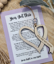 Load image into Gallery viewer, Wooden cancer ribbon heart engraved with uplifting message, 'You Are Not Alone' with a supportive, 'Your fight is our fight' message card.