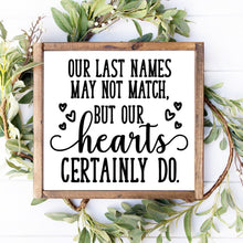 Load image into Gallery viewer, Our last names may not match but our hearts certainly do handmade painted wood sign