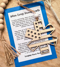 Load image into Gallery viewer, Wooden Star of Life EMT EMS Paramedic Charm Ornament with American Flag details and an inspirational appreciation message card for everyday heroes.
