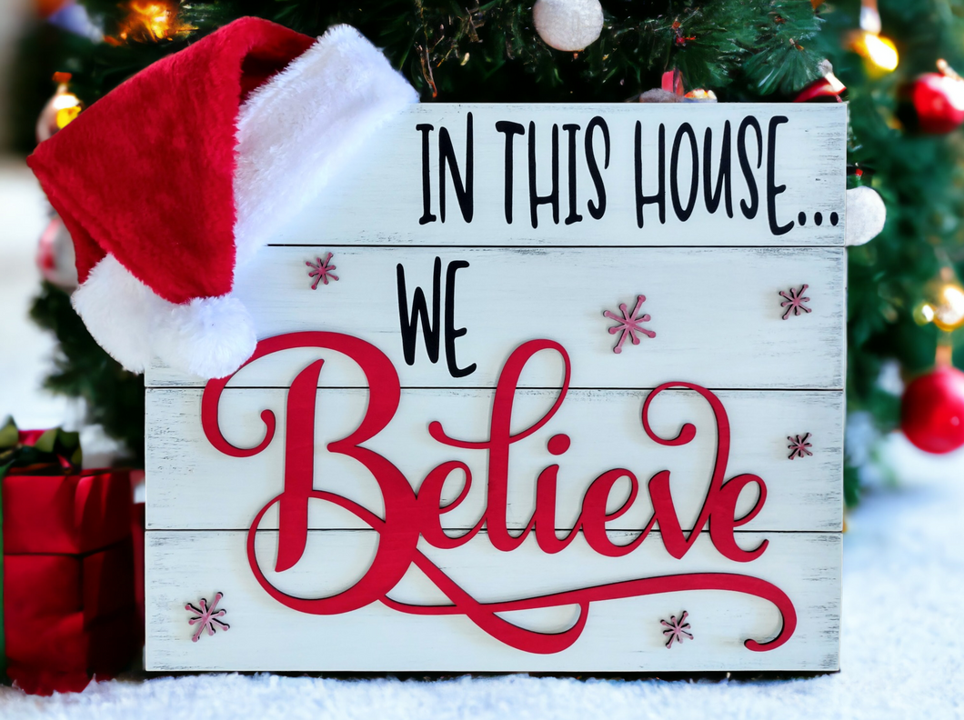 In This House We Believe-Santa Hat Wood Plank Sign