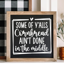 Load image into Gallery viewer, Framed sign with humorous text Some of Yall's Cornbread Ain't Done in the Middle.

