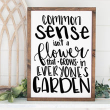 Load image into Gallery viewer, Common Sense Isn&#39;t a Flower that Grows in Everyone&#39;s Garden Painted Wood Sign
