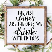 Load image into Gallery viewer, The best wines are the ones we drink with friends handmade painted wood sign.
